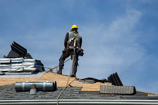 Professional Roofing technician working in Milton Village, MA